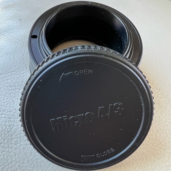 Dollice M42 to micro 4/3 adaptor with lens cap EUC - Picture 1 of 7